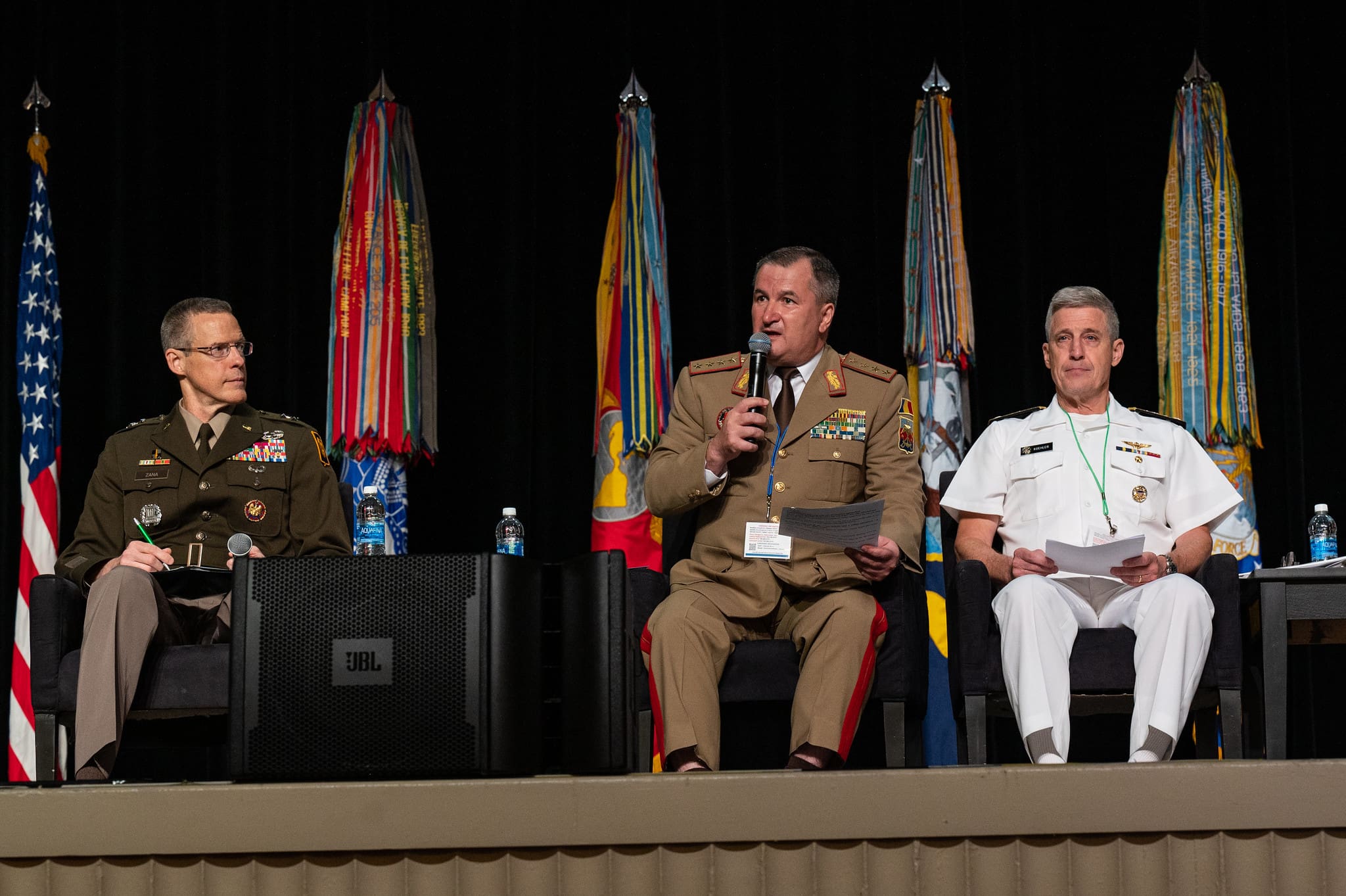 Romanian Gen. Daniel Petrescu, center, chief of defense for the Republic of Romania, speaks during the Department of Defense National Guard State Partnership Program (SPP) 30th Anniversary Conference at National Harbor, Md., July 18. The SPP pairs Guard elements with partner nations worldwide, building enduring relationships through mutual training exchanges that strengthen security, improve interoperability and enhance the readiness of U.S. and partner forces. Established in July 1993, the program began with less than a dozen partnerships and has grown to include 100 countries representing more than 50 percent of the world’s nations. Air National Guard photo by Tech. Sgt. Sarah M. McClanahan