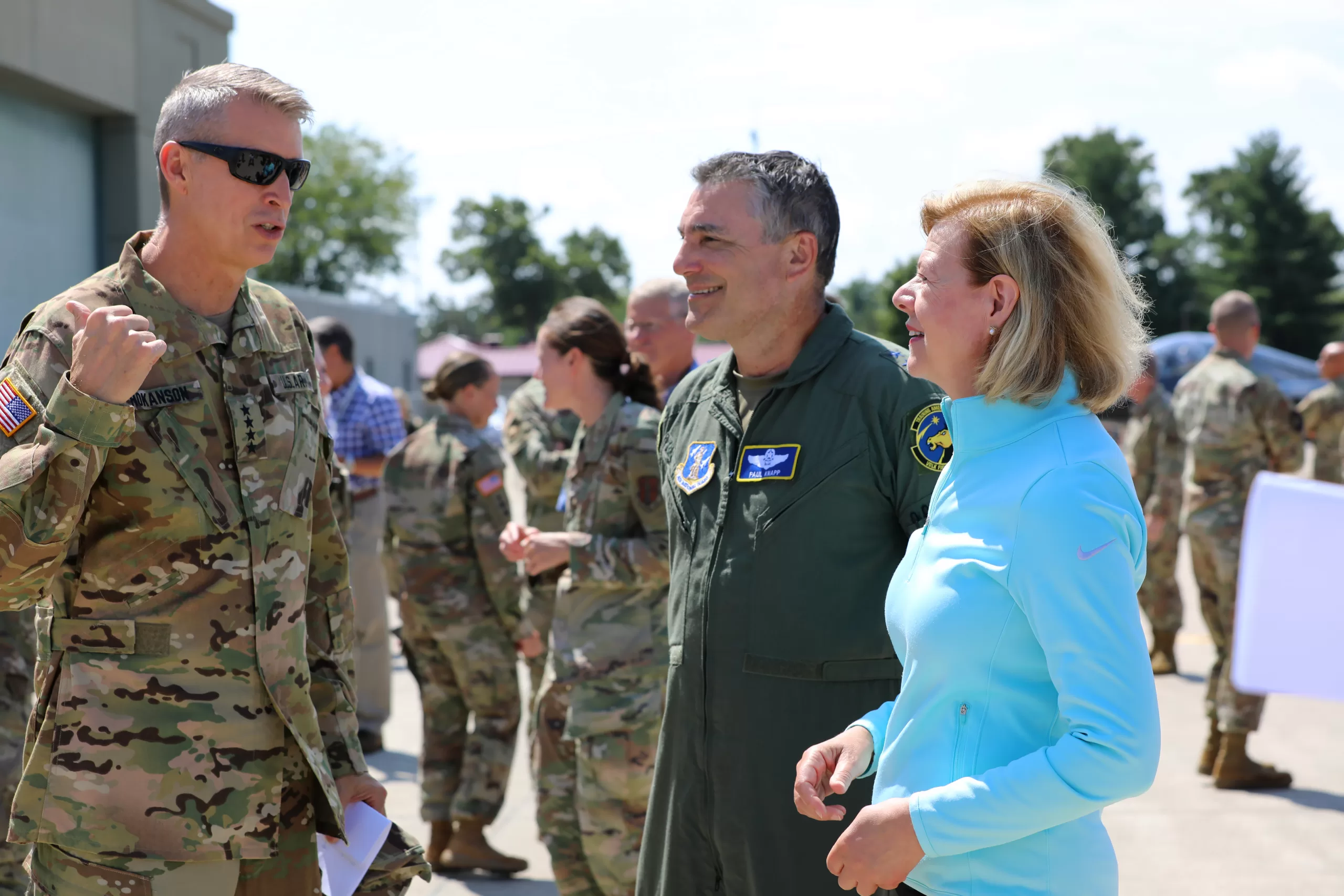Gen. Daniel Hokanson, chief of the National Guard Bureau, speaks with Maj. Gen. Paul Knapp, Wisconsin’s adjutant general, and U.S. Sen. Tammy Baldwin during Northern Lightning, a large-scale, full-spectrum counterland training exercise at Volk Field Combat Training Readiness Center Aug. 10. The goal of Northern Lightning is to provide tailored, cost-effective and realistic combat training for the Department of Defense total force. Wisconsin National Guard photo by Staff Sgt. Amber Peck