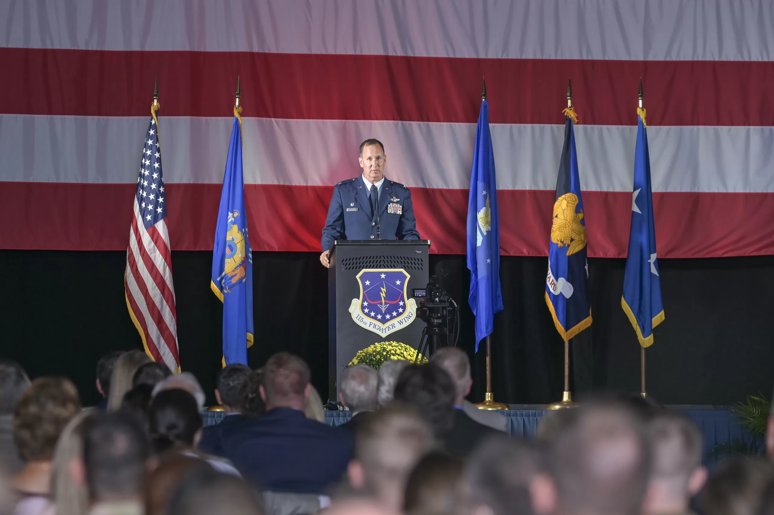 Col. Bart Van Roo, commander of the Wisconsin Air National Guard’s 115th Fighter Wing in Madison, Wis., speaks during a Sept. 7 ceremony to commemorate the fighter wing formally accepting the F-35 Lightning II mission. The 115th is only the second Air National Guard to field the 5th-generation fighter jet. 115th Fighter Wing photo by Tech. Sgt. Cameron Lewis
