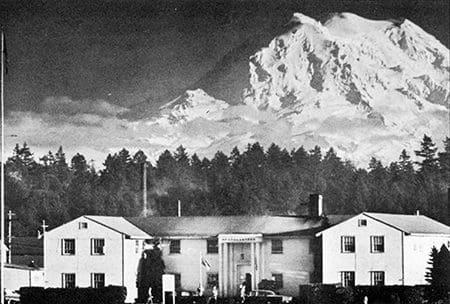 Mt. Rainer looms over the 32nd Infantry Division Headquarters at Fort Lewis, Wash. Photo courtesy of the 32nd Division Veterans Association