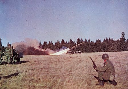 32nd Infantry Division Soldiers fire an Honest John rocket at Fort Lewis, Wash., in 1962. 32nd Infantry Division STRAC Yearbook, 1961-1962
