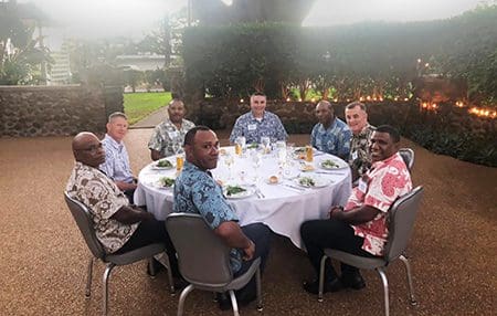 Maj. Gen. Paul Knapp, Wisconsin’s adjutant general (center), enjoys dinner with Maj. Gen. Maj. Gen. Gilbert Toropo, the Papua New Guinea Chief of Defense (center right), with General Charles Flynn, U.S. Army Pacific (right of Toropo) in September 2021 in Hawaii. Knapp visited Hawaii to meet with Toropo and attend a series of conferences in conjunction with the Wisconsin National Guard’s partnership with Papua New Guinea through the State Partnership Program. Submitted photo